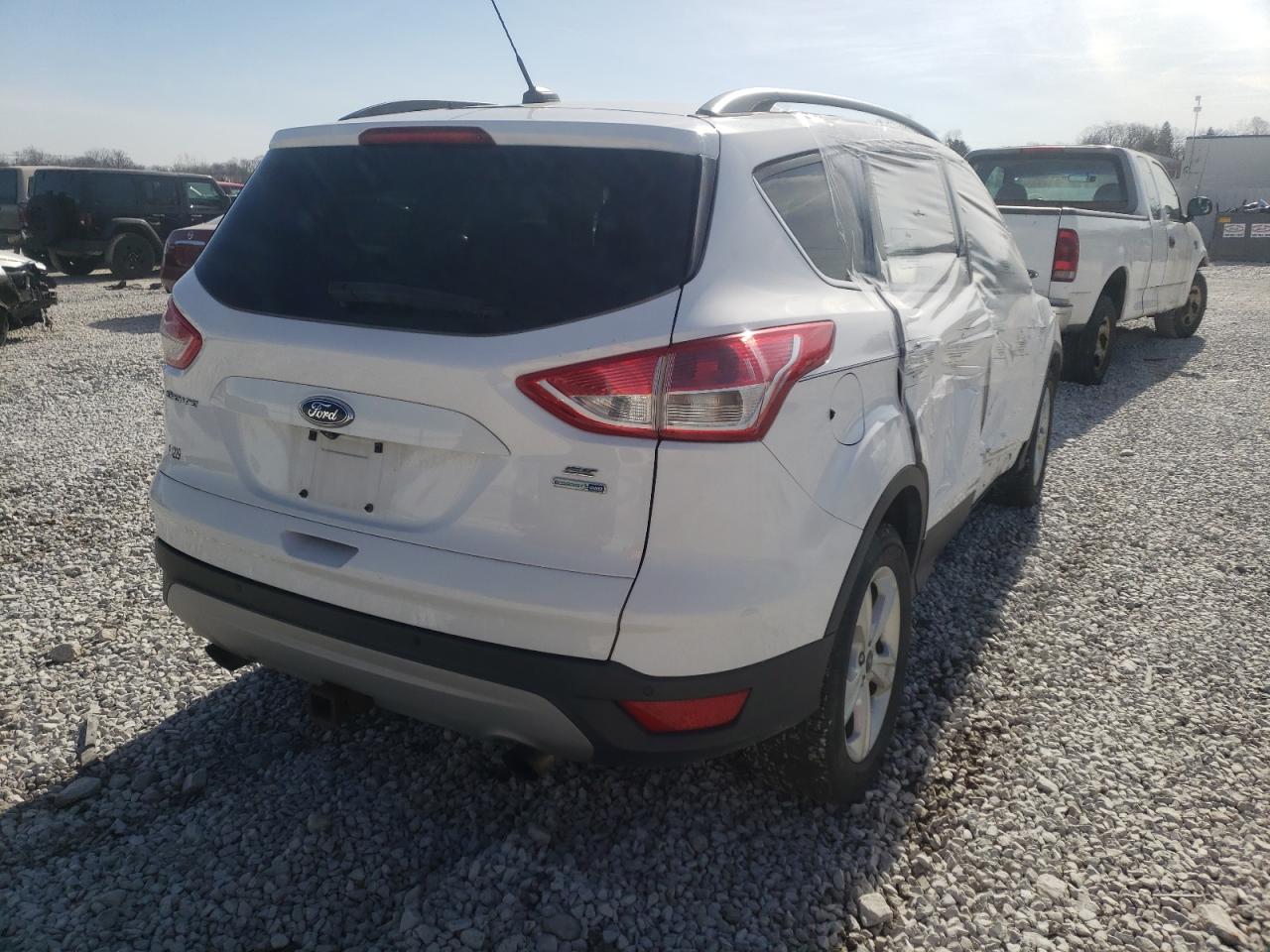 Photo 4 from auction – 2014 FORD ESCAPE SE with VIN 1FMCU9G93EUC51939