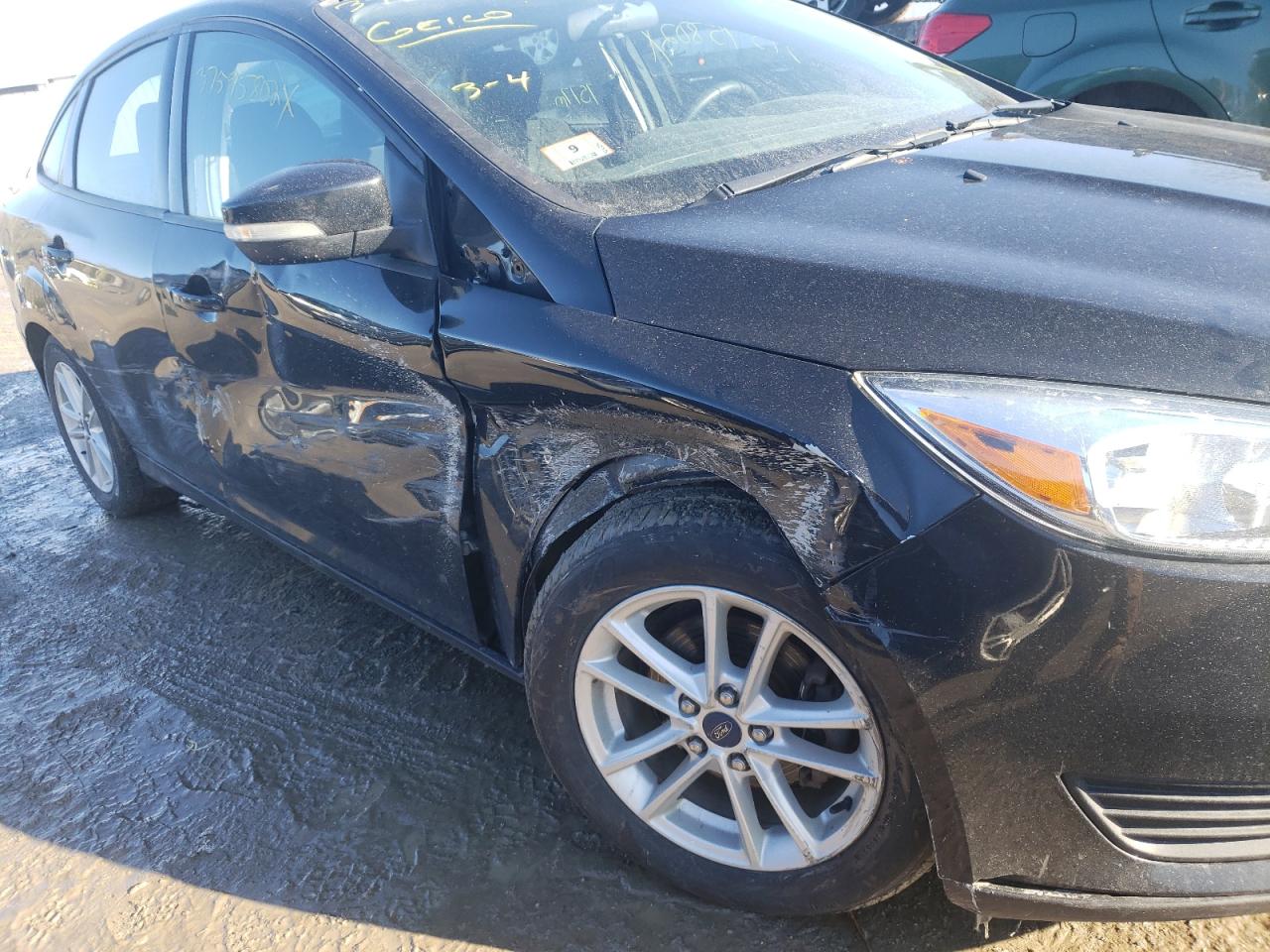 Photo 9 from auction – 2015 FORD FOCUS SE with VIN 1FADP3F24FL335346