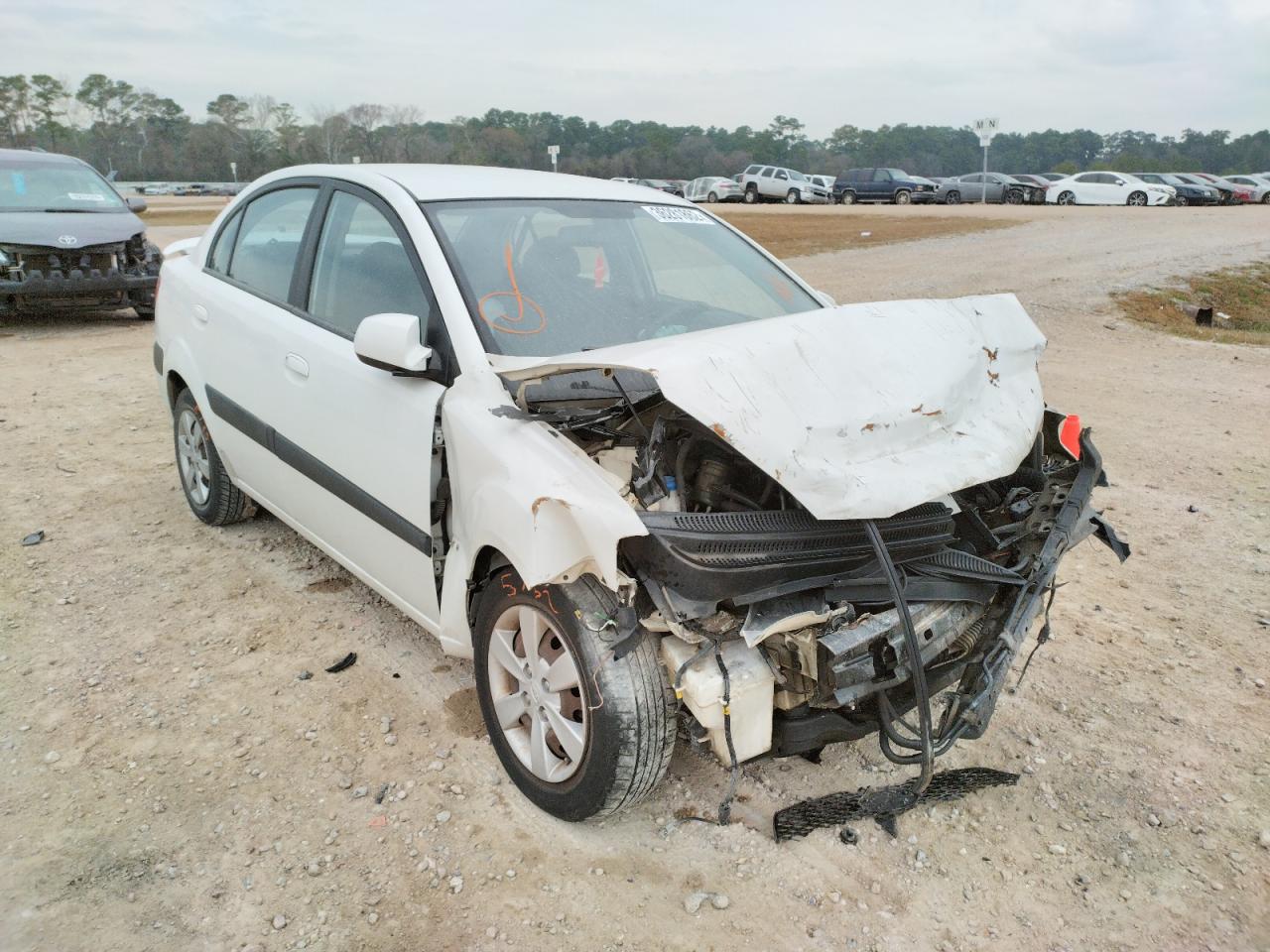 KIA RIO BASE 2009 with VIN KNADE223096443374 - Photo from auction