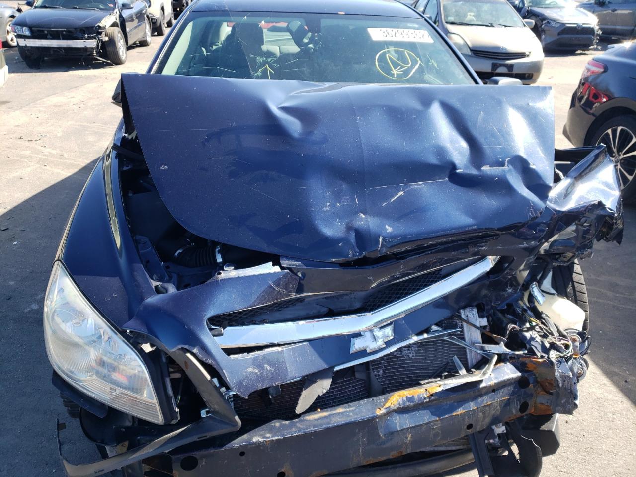 Photo 7 from auction – 2011 CHEVROLET MALIBU LS with VIN 1G1ZB5E11BF128014
