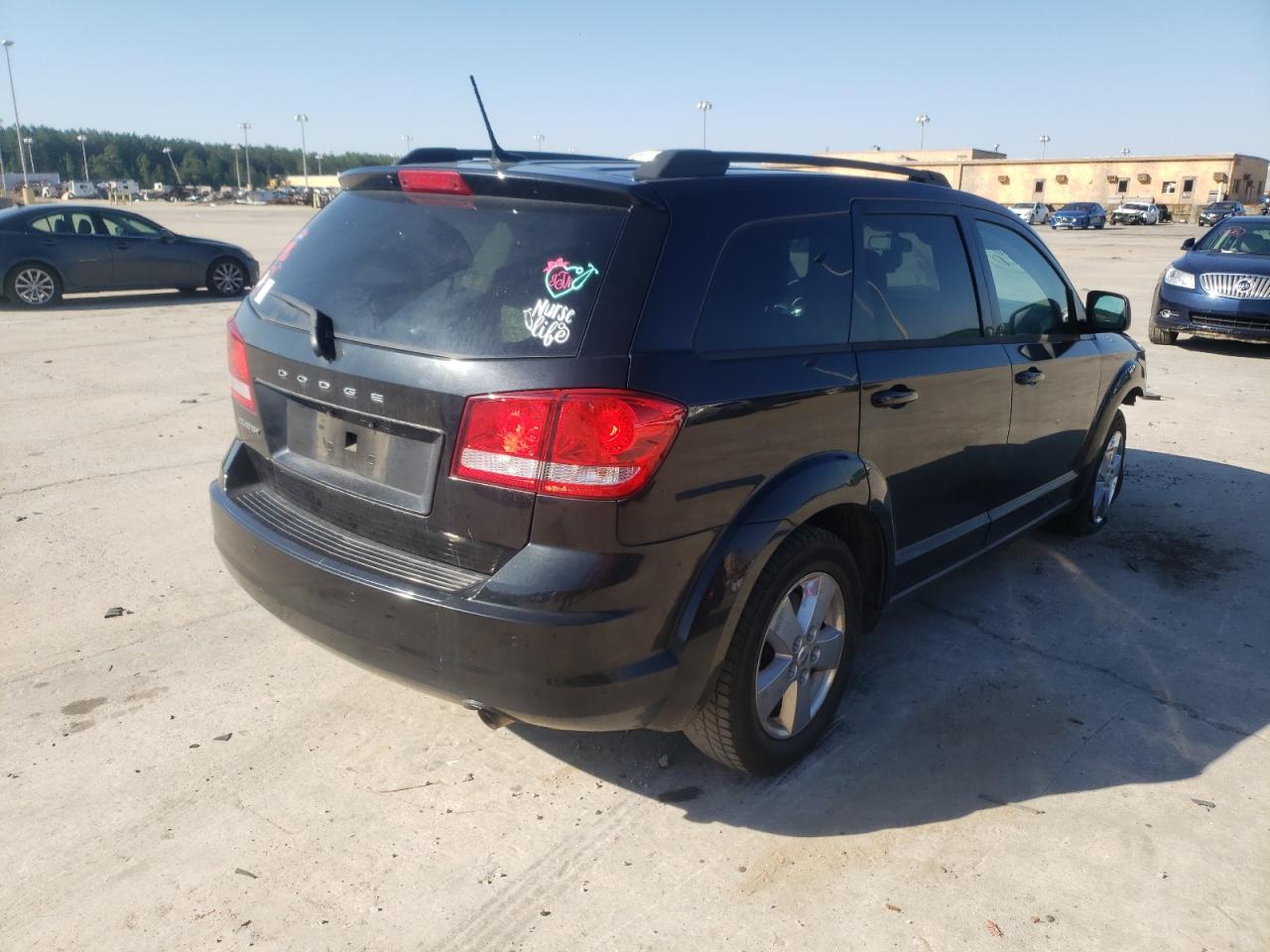 Photo 4 from auction – 2013 DODGE JOURNEY SE with VIN 3C4PDCAB8DT655911
