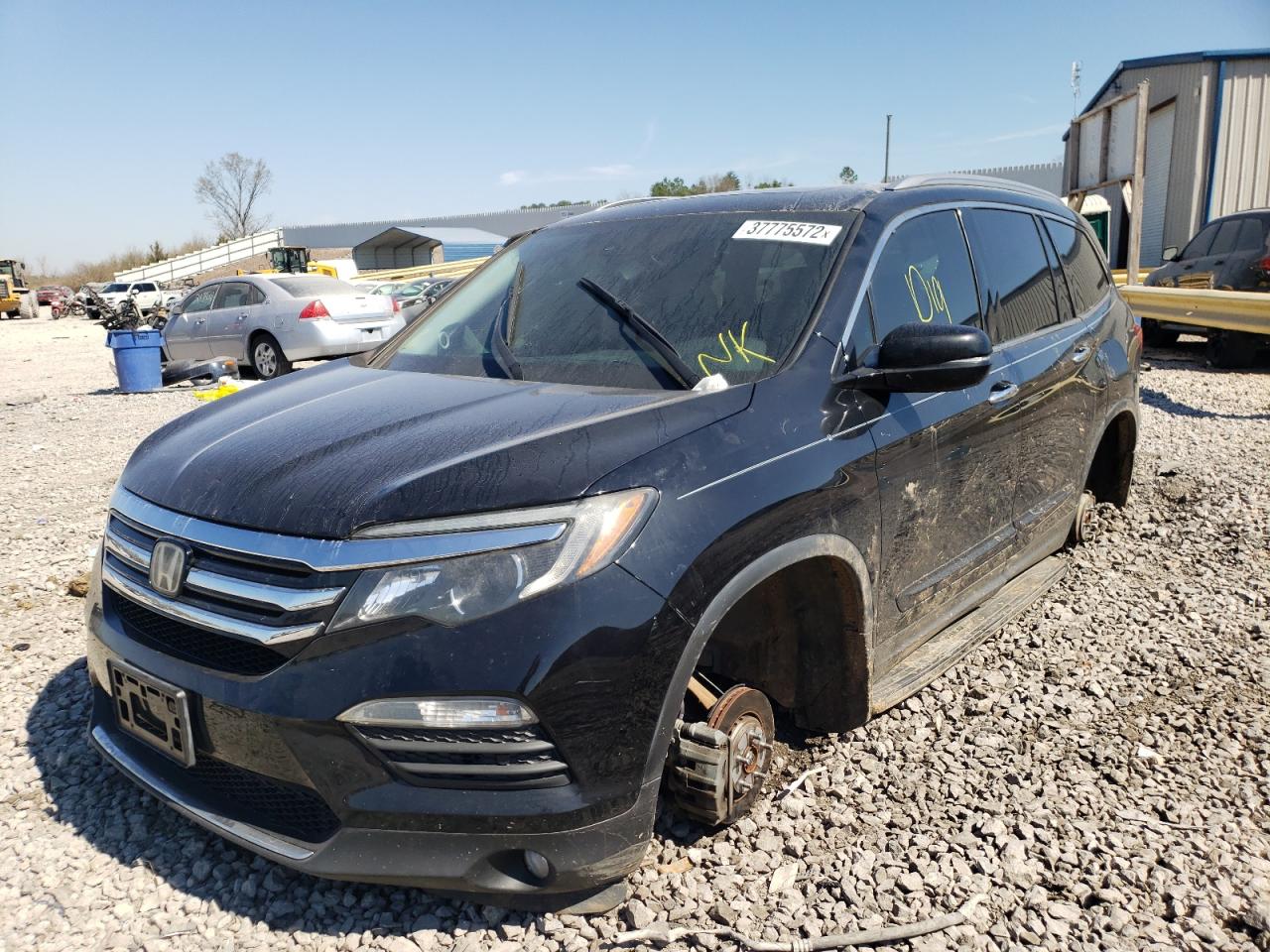 Photo 2 from auction – 2016 HONDA PILOT TOUR with VIN 5FNYF5H94GB004744