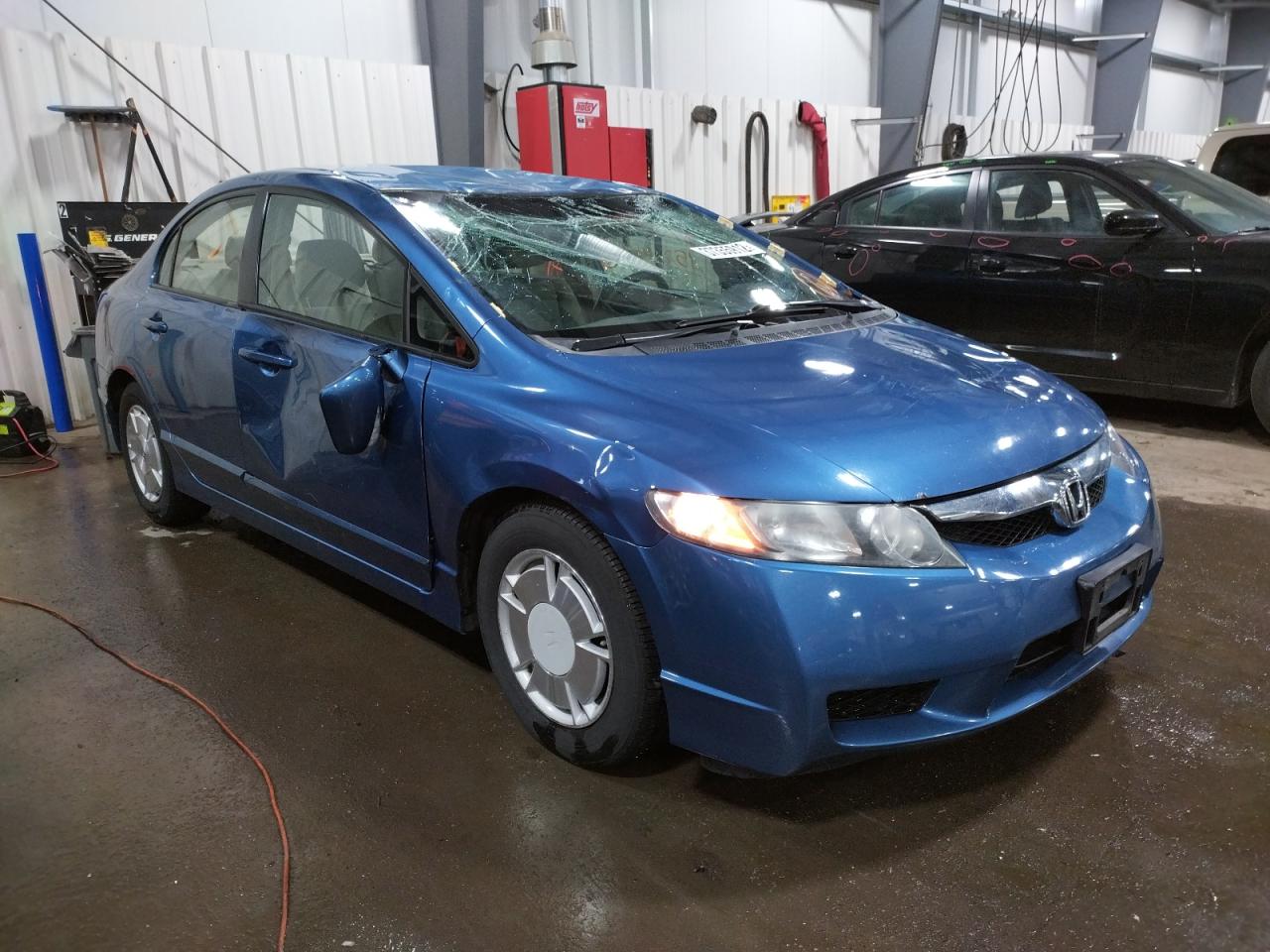 HONDA CIVIC HYBR 2010 with VIN JHMFA3F25AS006284 - Photo from auction