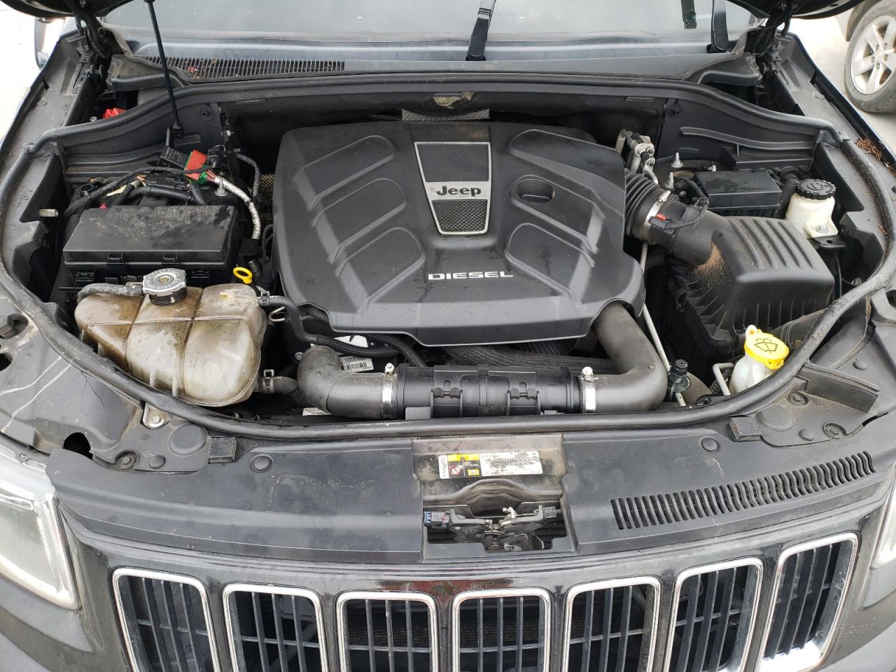 Photo 7 from auction – 2014 JEEP GRAND CHER with VIN 1C4RJEBM2EC390073