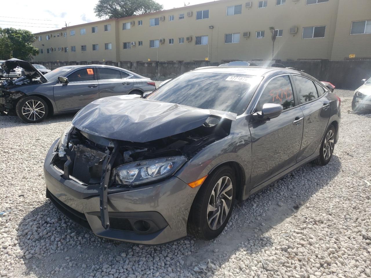 Photo 2 from auction – 2016 HONDA CIVIC EX with VIN 2HGFC2F83GH504835