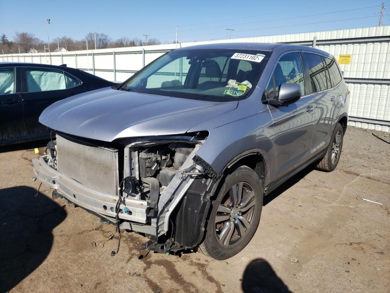 Photo 2 from auction – 2016 HONDA PILOT EXL with VIN 5FNYF6H69GB024497