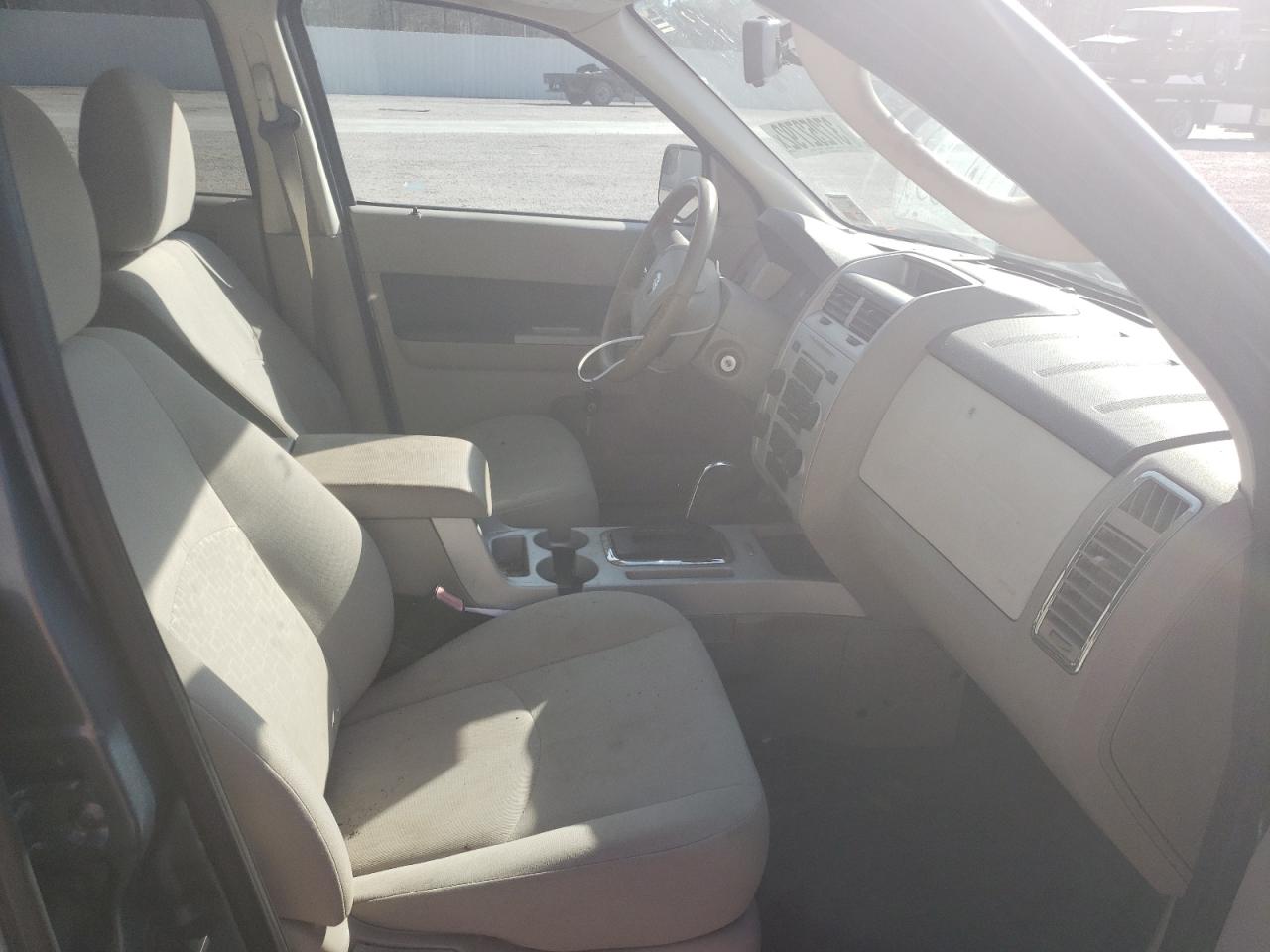 Photo 5 from auction – 2010 MERCURY MARINER with VIN 4M2CN8B79AKJ28308