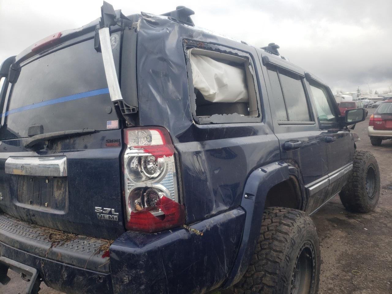 Photo 10 from auction – 2006 JEEP COMMANDER with VIN 1J8HG58206C165323