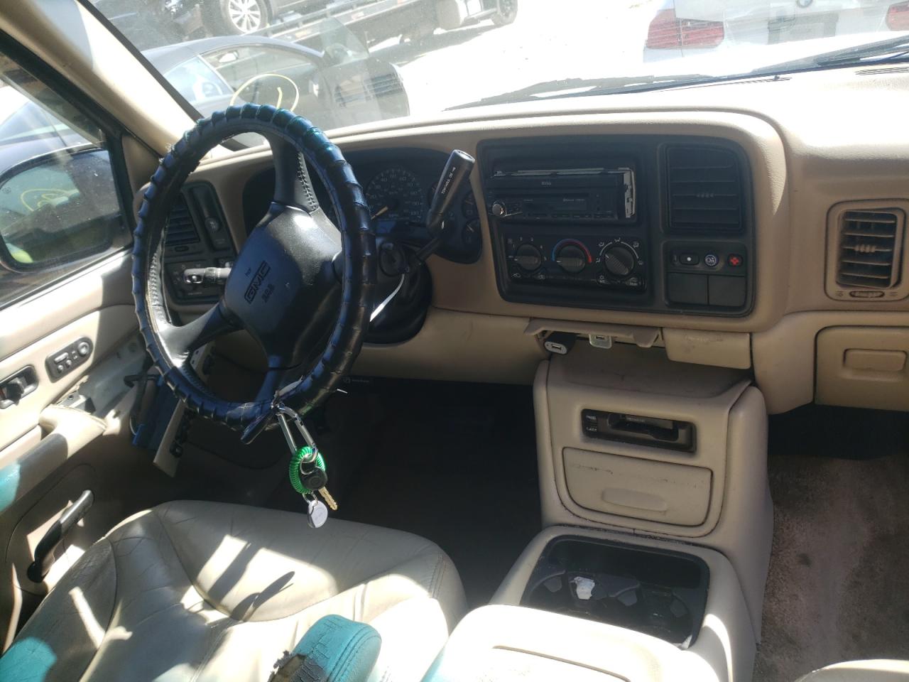 Photo 9 from auction – 2001 GMC YUKON with VIN 1GKEC13T21R154154
