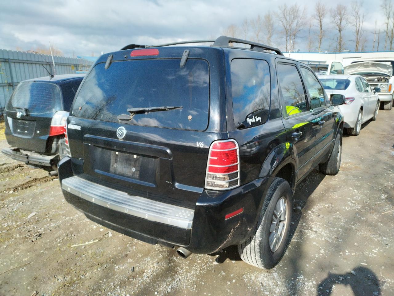 Photo 4 from auction – 2005 MERCURY MARINER with VIN 4M2YU56195DJ00094