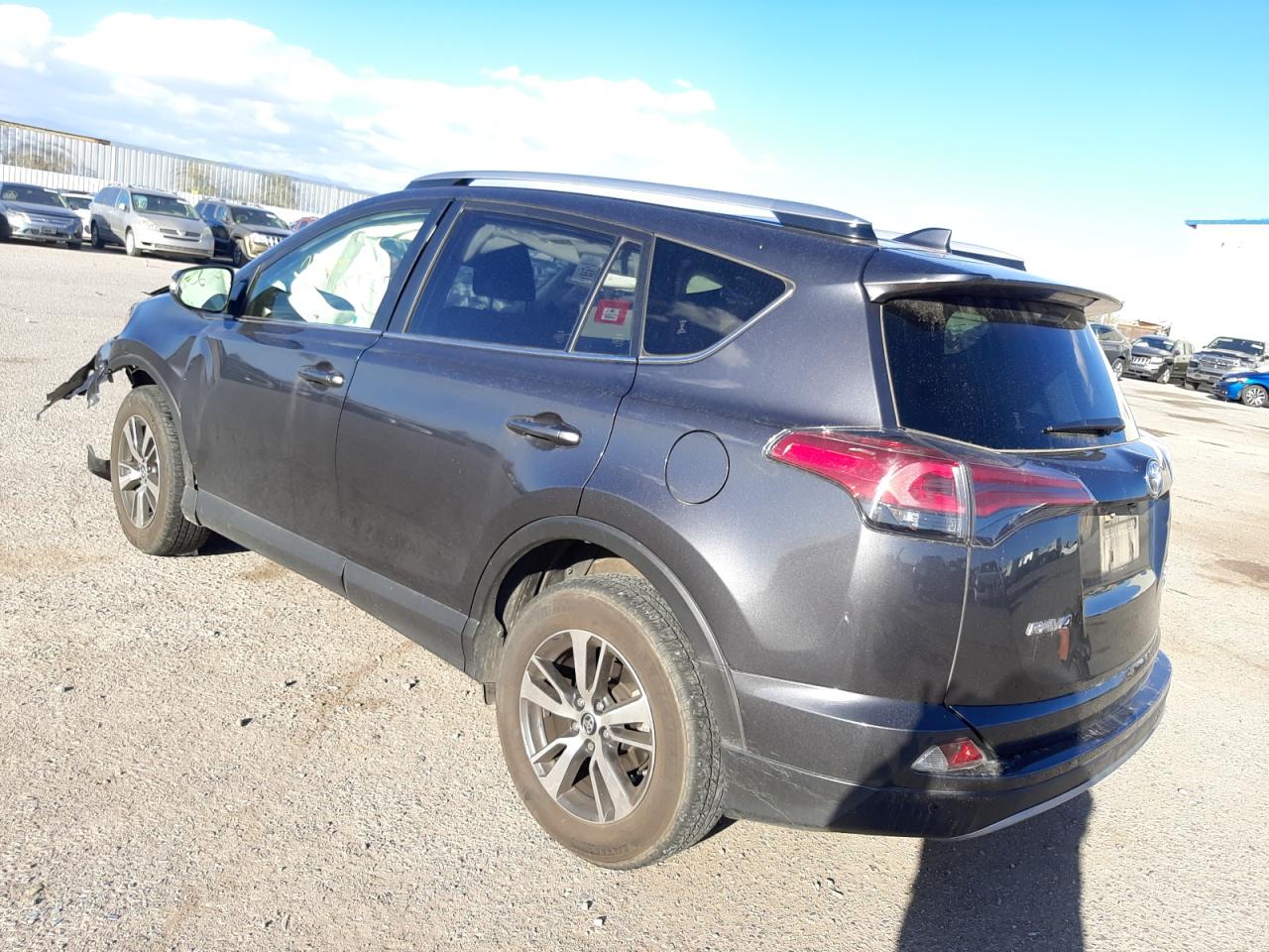 Photo 3 from auction – 2017 TOYOTA RAV4 XLE with VIN JTMRFREV7HJ154192