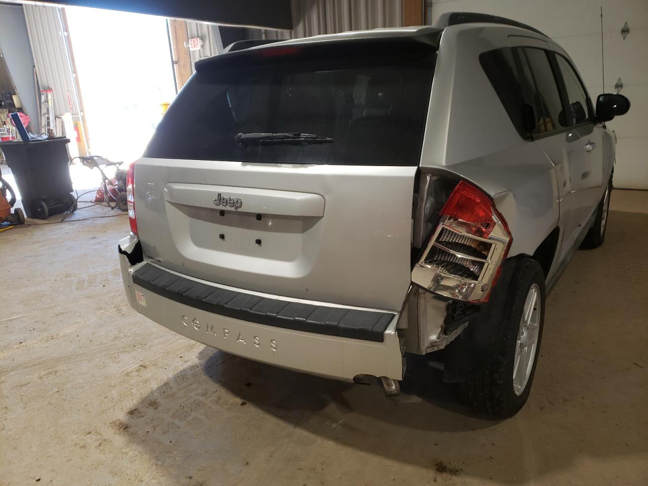 Photo 9 from auction – 2010 JEEP COMPASS SP with VIN 1J4NT4FB6AD578847