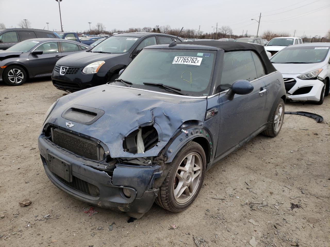 Photo 9 from auction – 2009 MINI COOPER S with VIN WMWMS33599TY07808