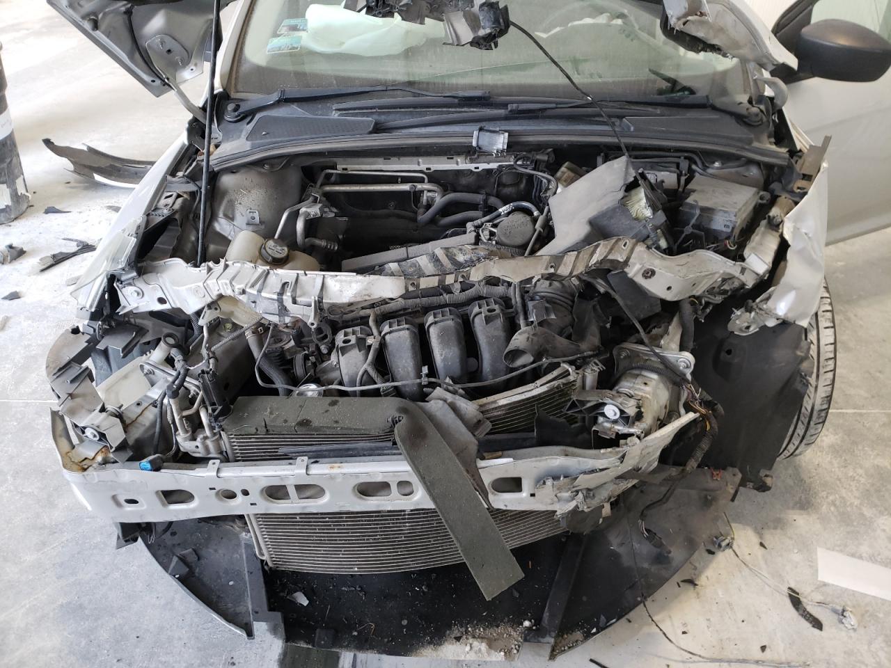 Photo 7 from auction – 2013 FORD FOCUS S with VIN 1FADP3E25DL182023