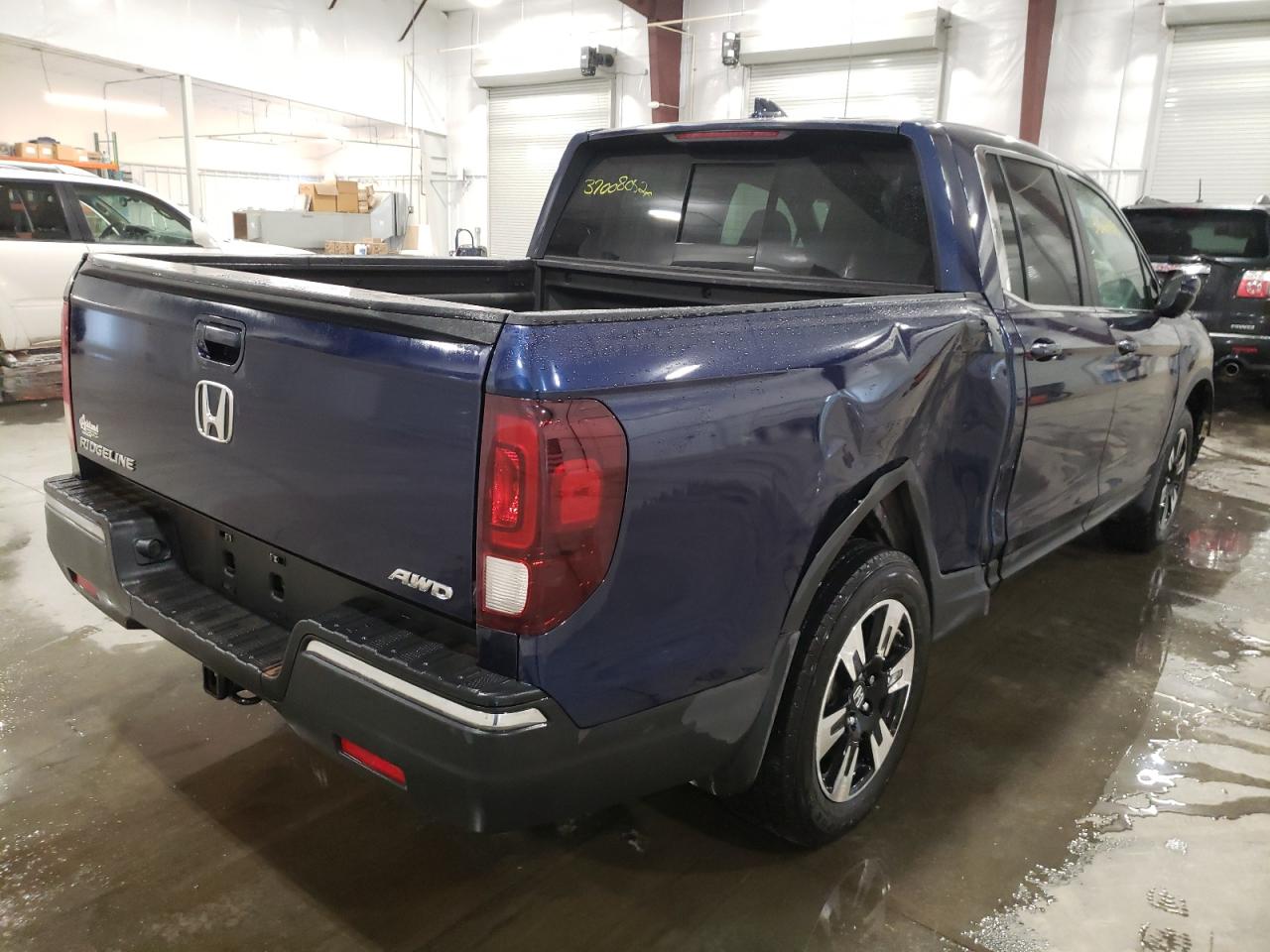 Photo 4 from auction – 2020 HONDA RIDGELINE with VIN 5FPYK3F51LB016108
