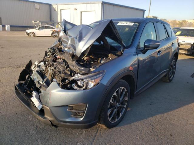 Photo 2 from auction – 2016 MAZDA CX-5 GT with VIN JM3KE2DY7G0798780