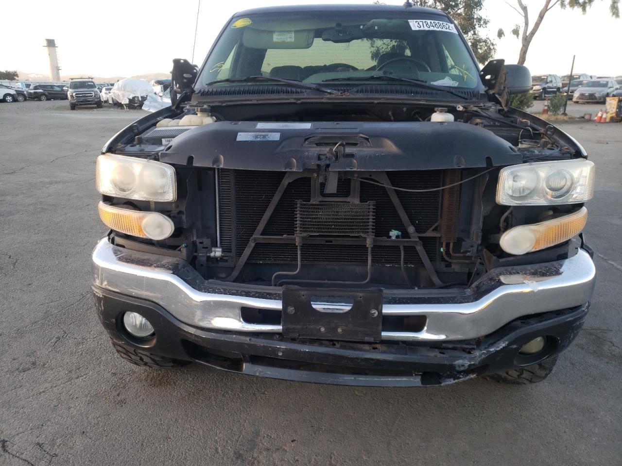 Photo 9 from auction – 2004 GMC SIERRA C25 with VIN 1GTHC29U64E358093
