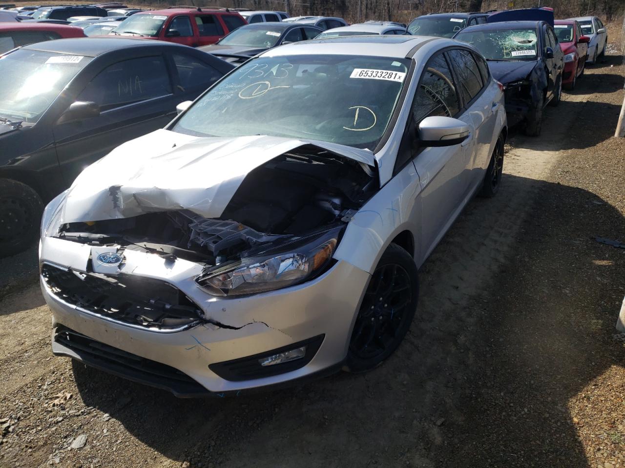 Photo 2 from auction – 2016 FORD FOCUS SE with VIN 1FADP3K29GL385425