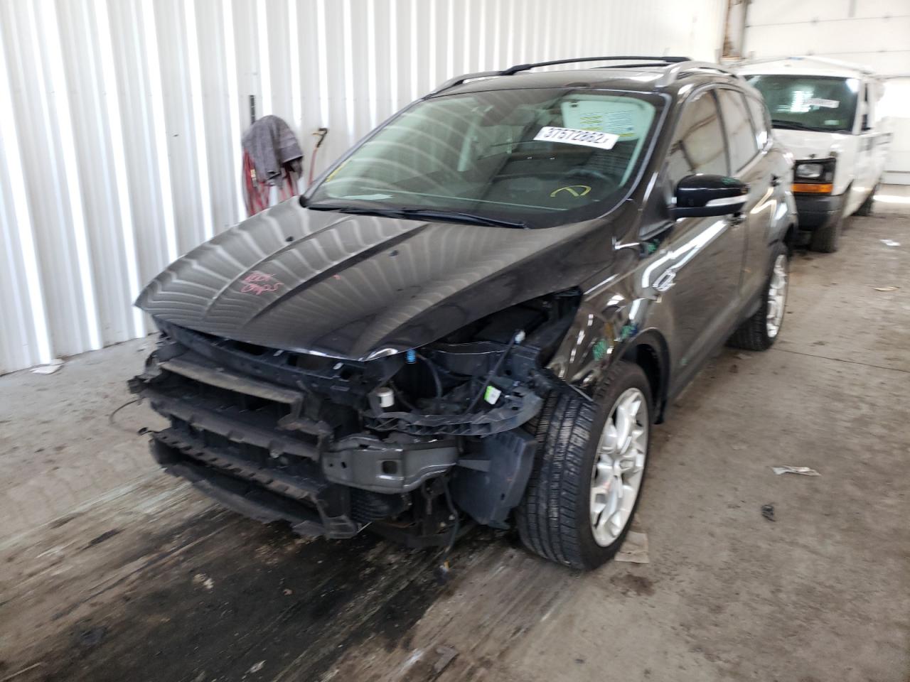 Photo 2 from auction – 2014 FORD ESCAPE TIT with VIN 1FMCU9J97EUB20070
