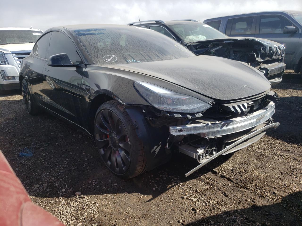 TESLA MODEL 3 2021 with VIN 5YJ3E1EC0MF062626 - Photo from auction