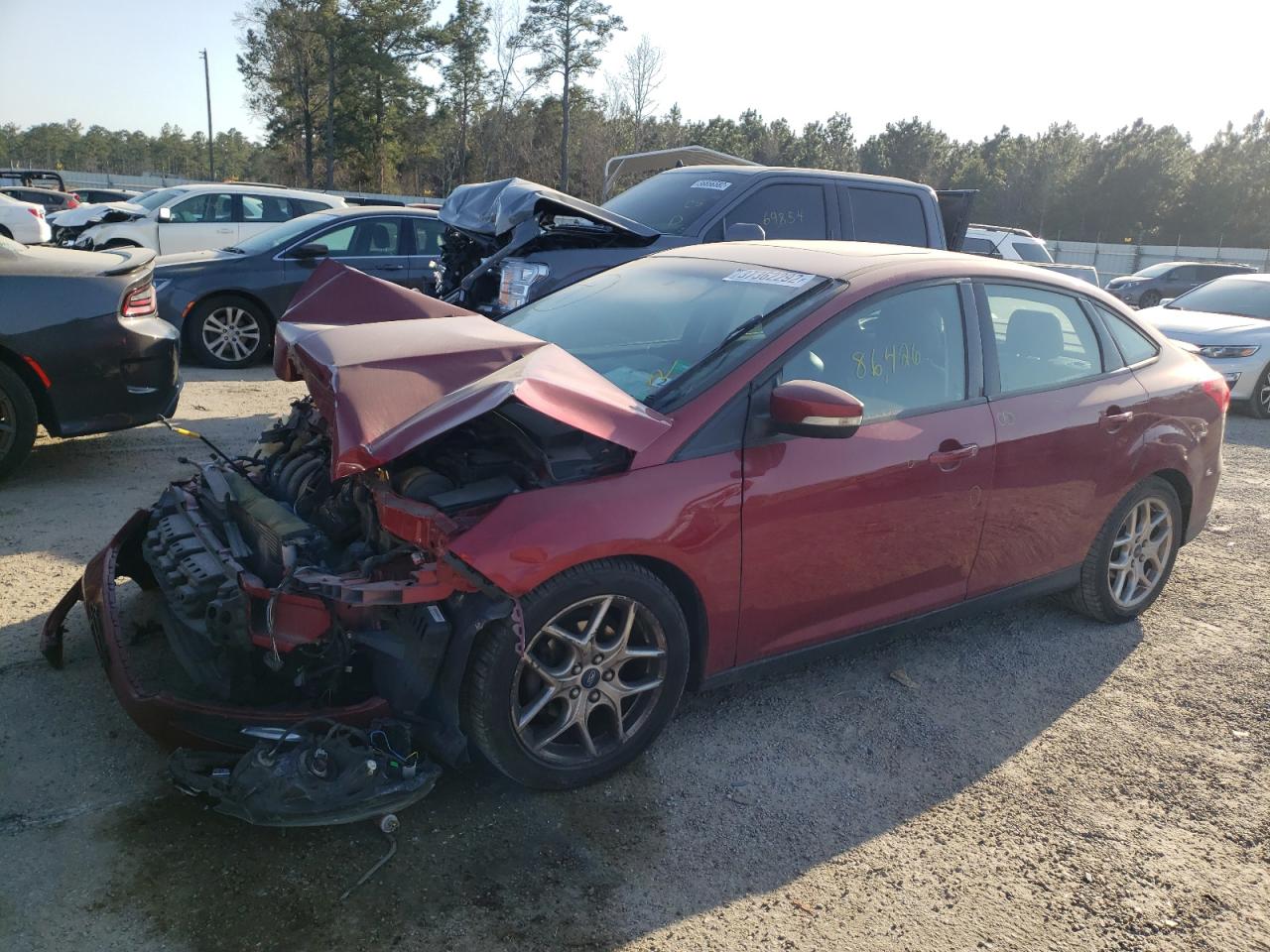Photo 2 from auction – 2015 FORD FOCUS SE with VIN 1FADP3F22FL283960
