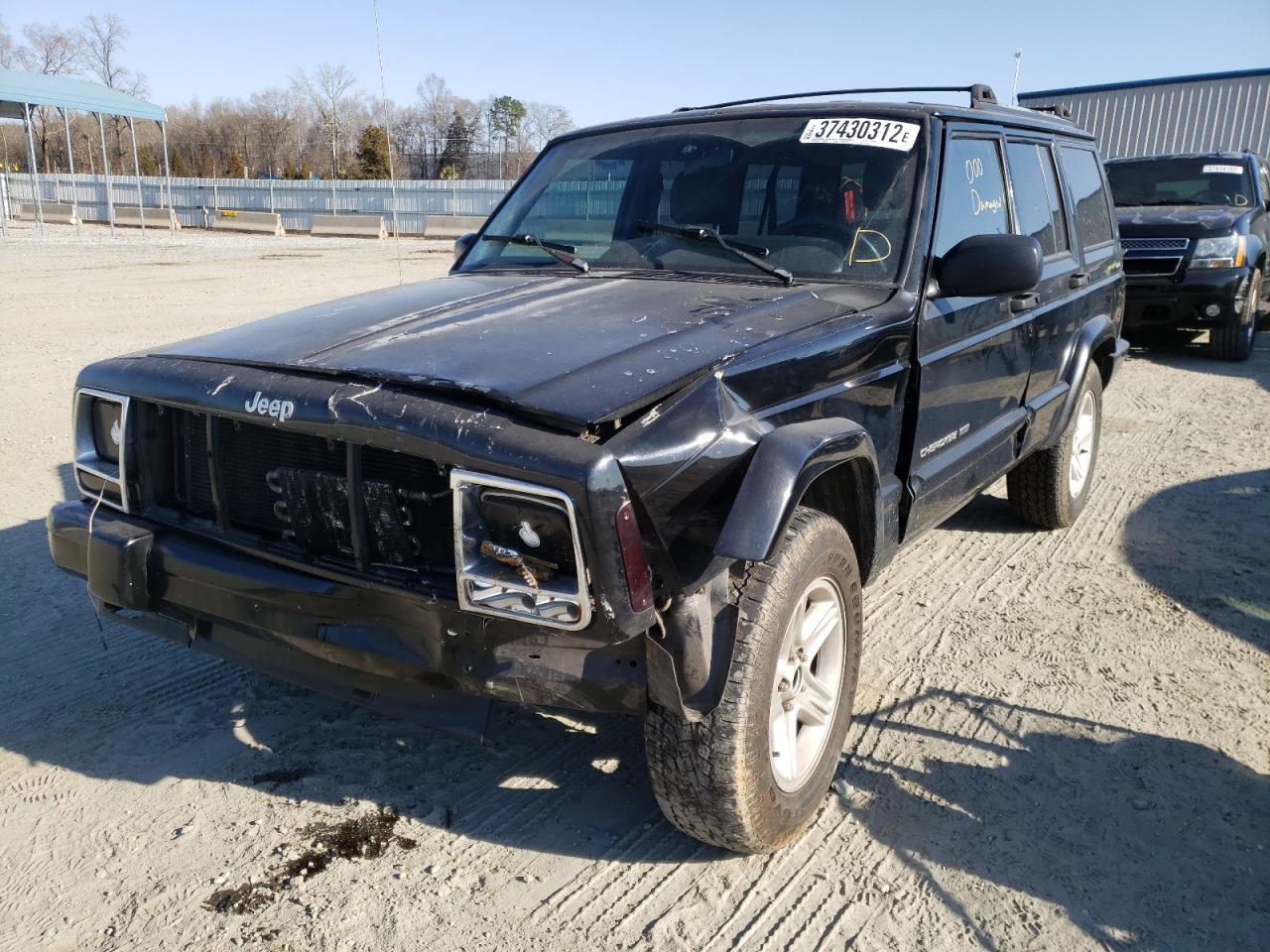 Photo 2 from auction – 2000 JEEP CHEROKEE L with VIN 1J4FF68S1YL233391