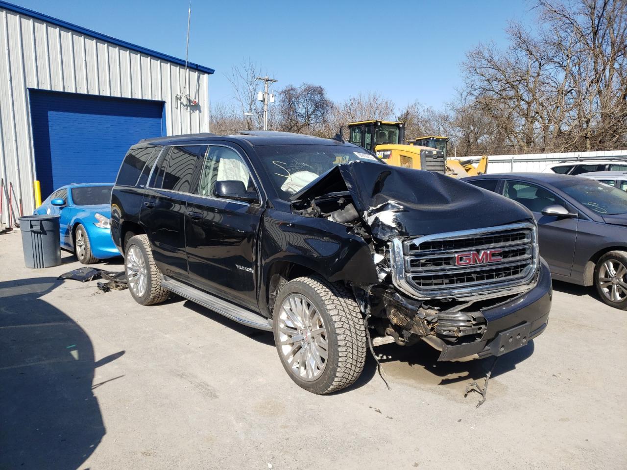 GMC YUKON SLE 2015 with VIN 1GKS2AKC5FR505735 - Photo from auction