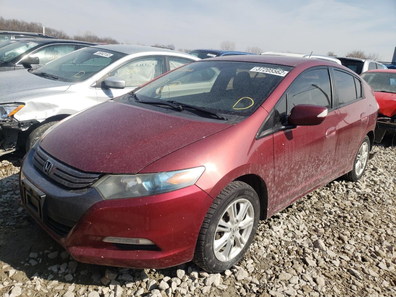 Photo 2 from auction – 2010 HONDA INSIGHT EX with VIN JHMZE2H7XAS028138