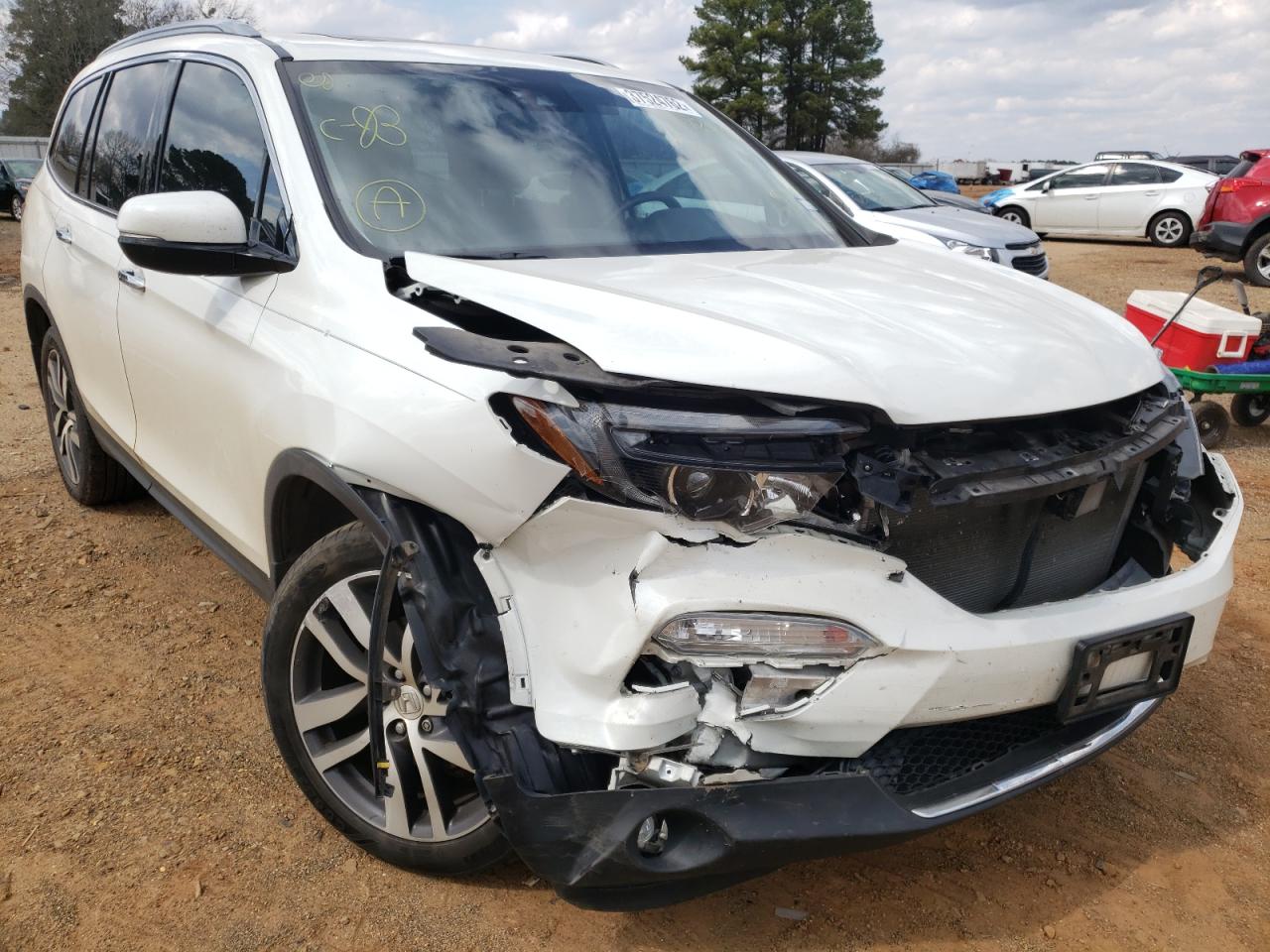 HONDA PILOT ELIT 2017 with VIN 5FNYF6H06HB067286 - Photo from auction