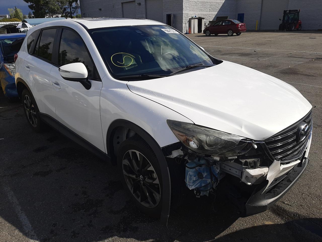 MAZDA CX-5 GT 2016 with VIN JM3KE2DY9G0659587 - Photo from auction