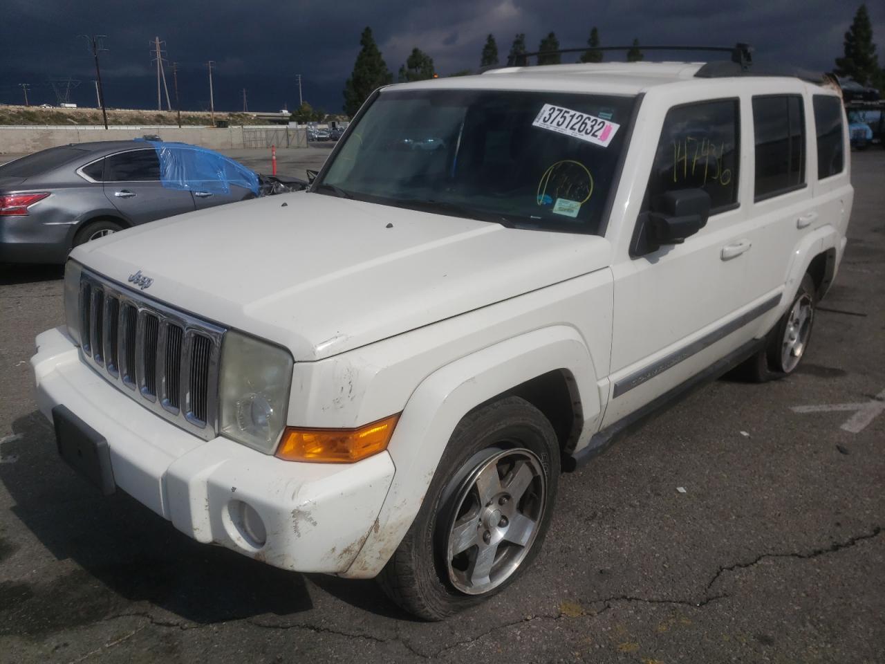 Photo 2 from auction – 2010 JEEP COMMANDER with VIN 1J4RH4GK6AC159260