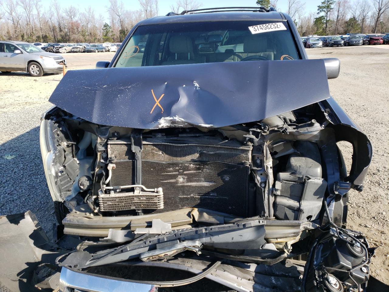 Foto 7 de la subasta – 2014 HONDA PILOT EXL con VIN 5FNYF4H53EB015836