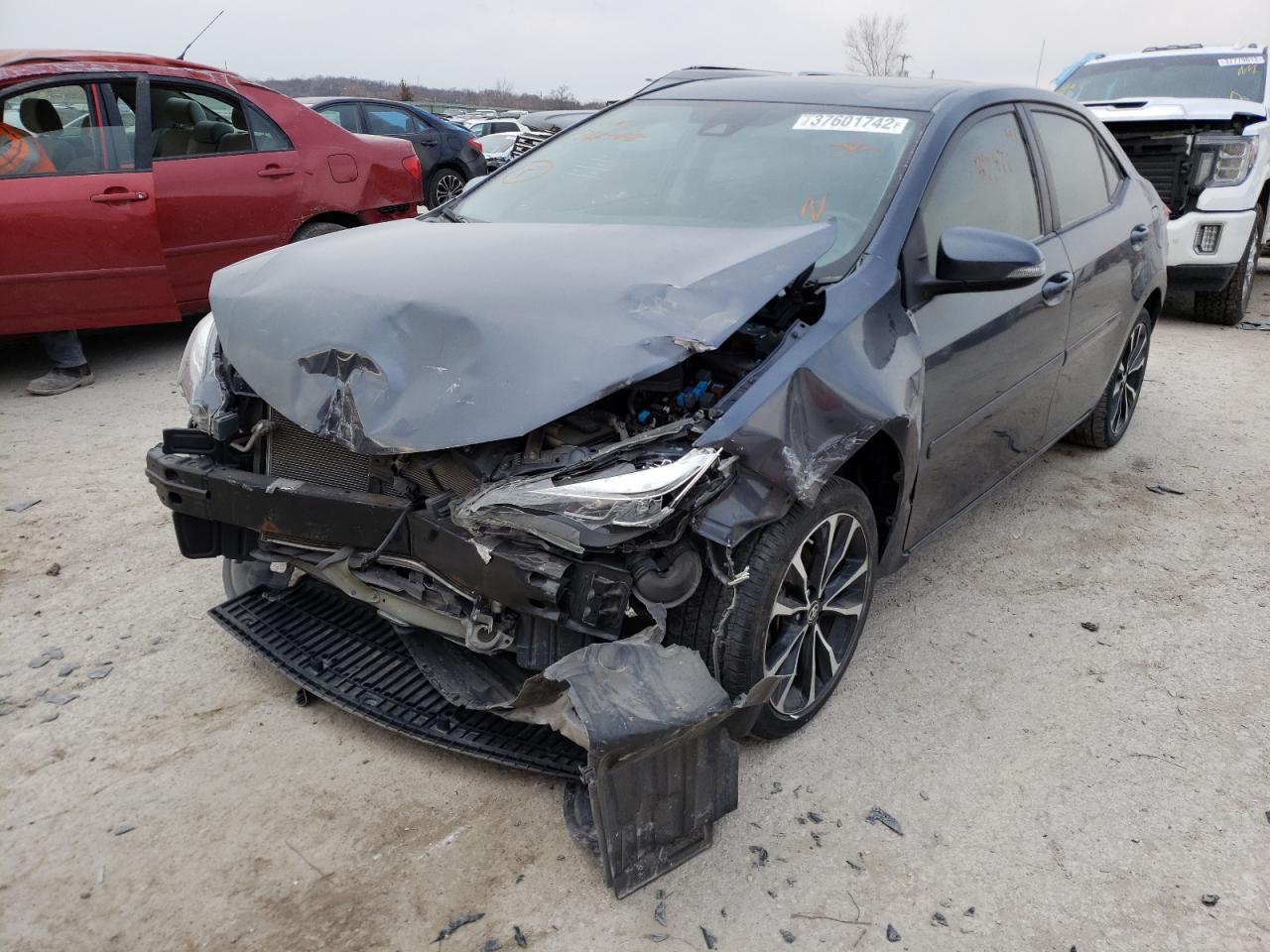 Photo 2 from auction – 2018 TOYOTA COROLLA L with VIN 5YFBURHE8JP766468
