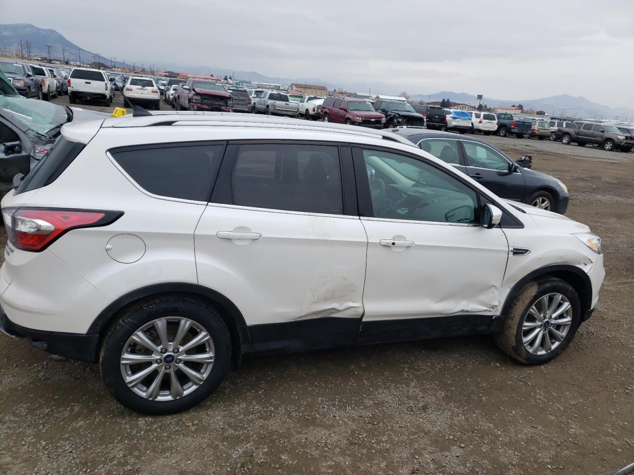 Photo 9 from auction – 2018 FORD ESCAPE TIT with VIN 1FMCU9J99JUB26690