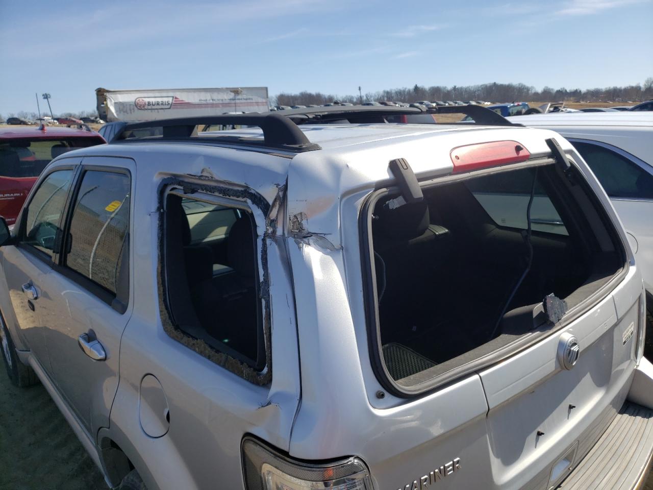 Photo 9 from auction – 2010 MERCURY MARINER with VIN 4M2CN8B71AKJ23233