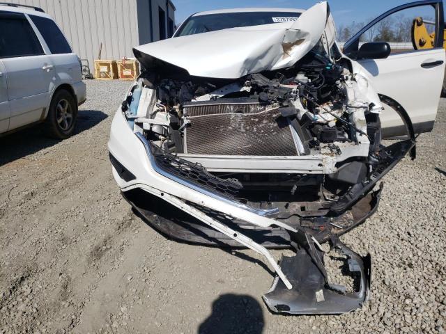 Photo 7 from auction – 2015 HONDA CR-V LX with VIN 5J6RM3H37FL008898