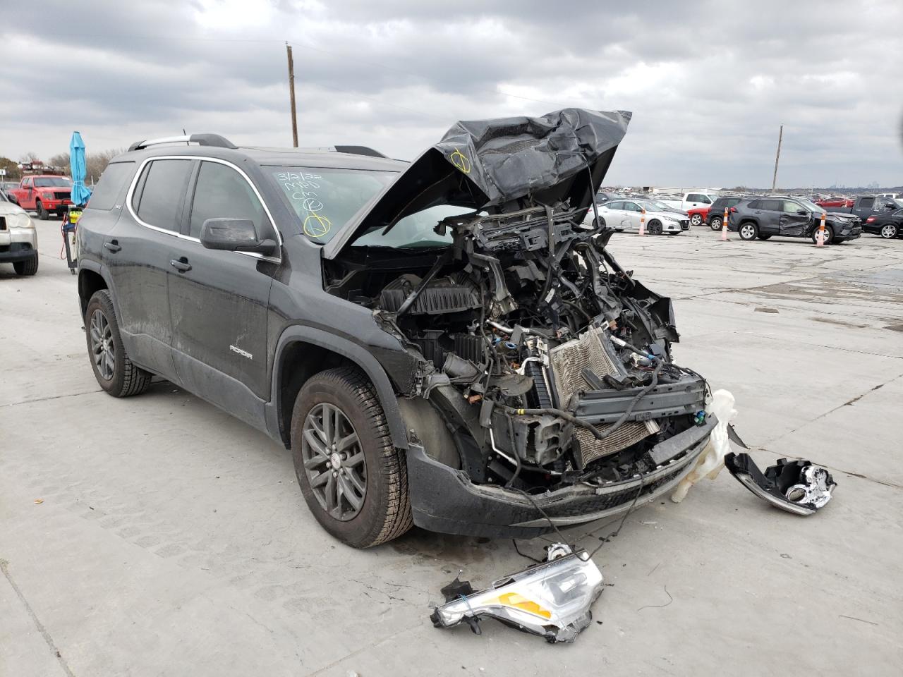 GMC ACADIA SLT 2018 with VIN 1GKKNMLS9JZ217854 - Photo from auction