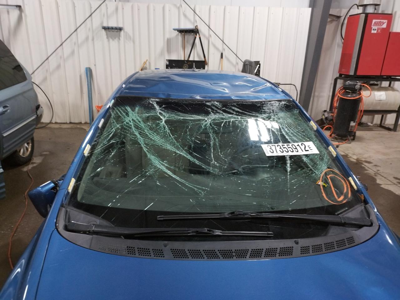 Photo 9 from auction – 2010 HONDA CIVIC HYBR with VIN JHMFA3F25AS006284