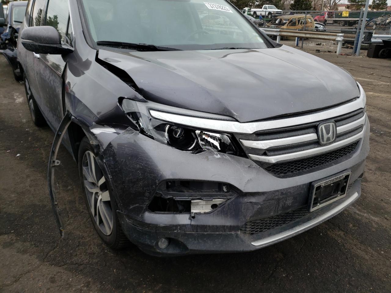 Photo 9 from auction – 2017 HONDA PILOT ELIT with VIN 5FNYF6H08HB046410