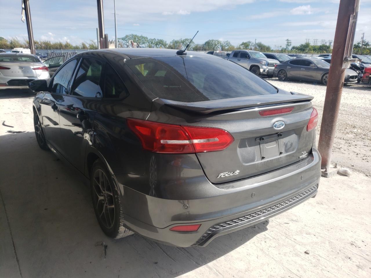 Photo 3 from auction – 2015 FORD FOCUS SE with VIN 1FADP3F24FL215594