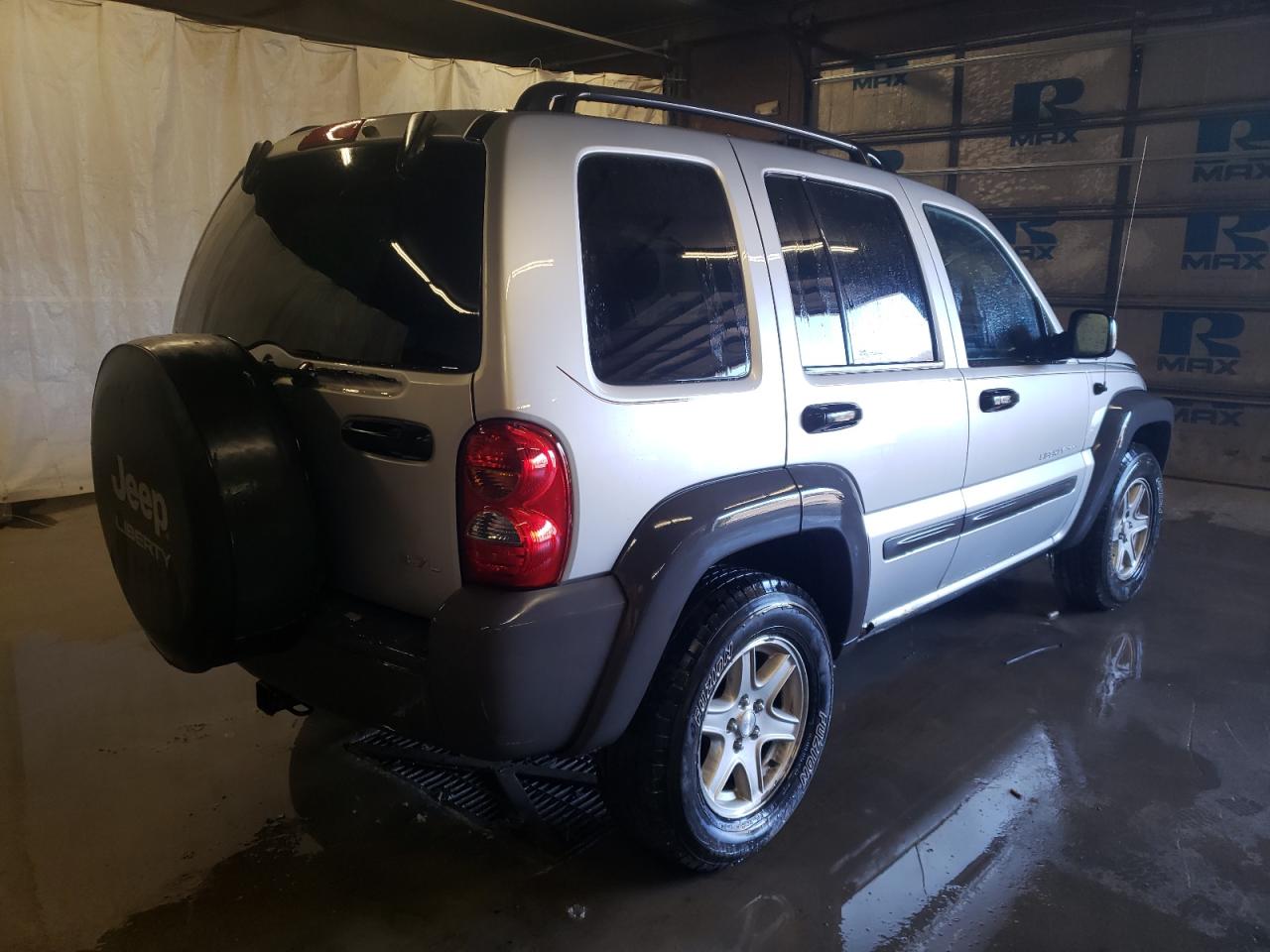 Photo 4 from auction – 2003 JEEP LIBERTY SP with VIN 1J4GL48K63W630118