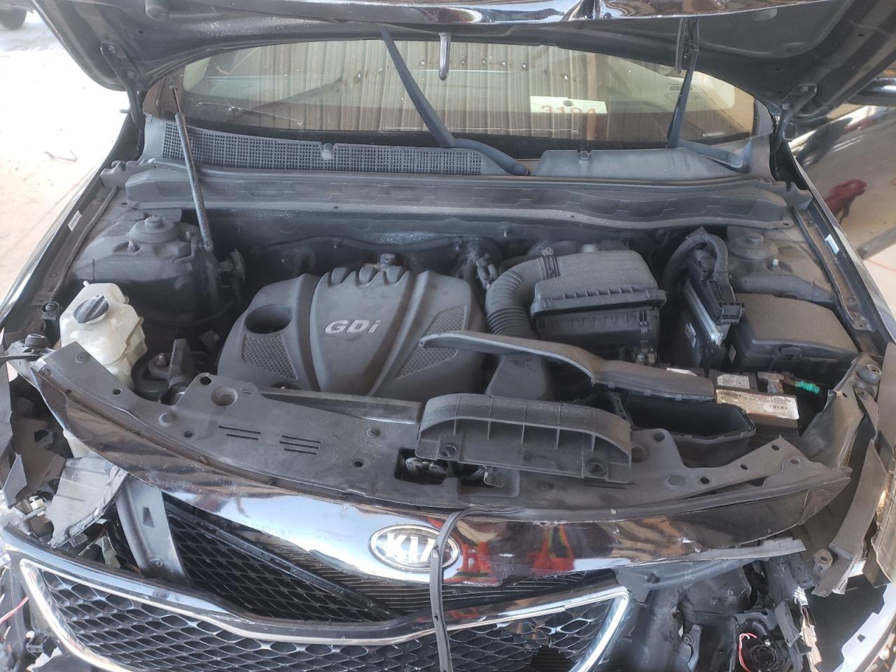 Photo 7 from auction – 2015 KIA OPTIMA LX with VIN 5XXGM4A76FG439975