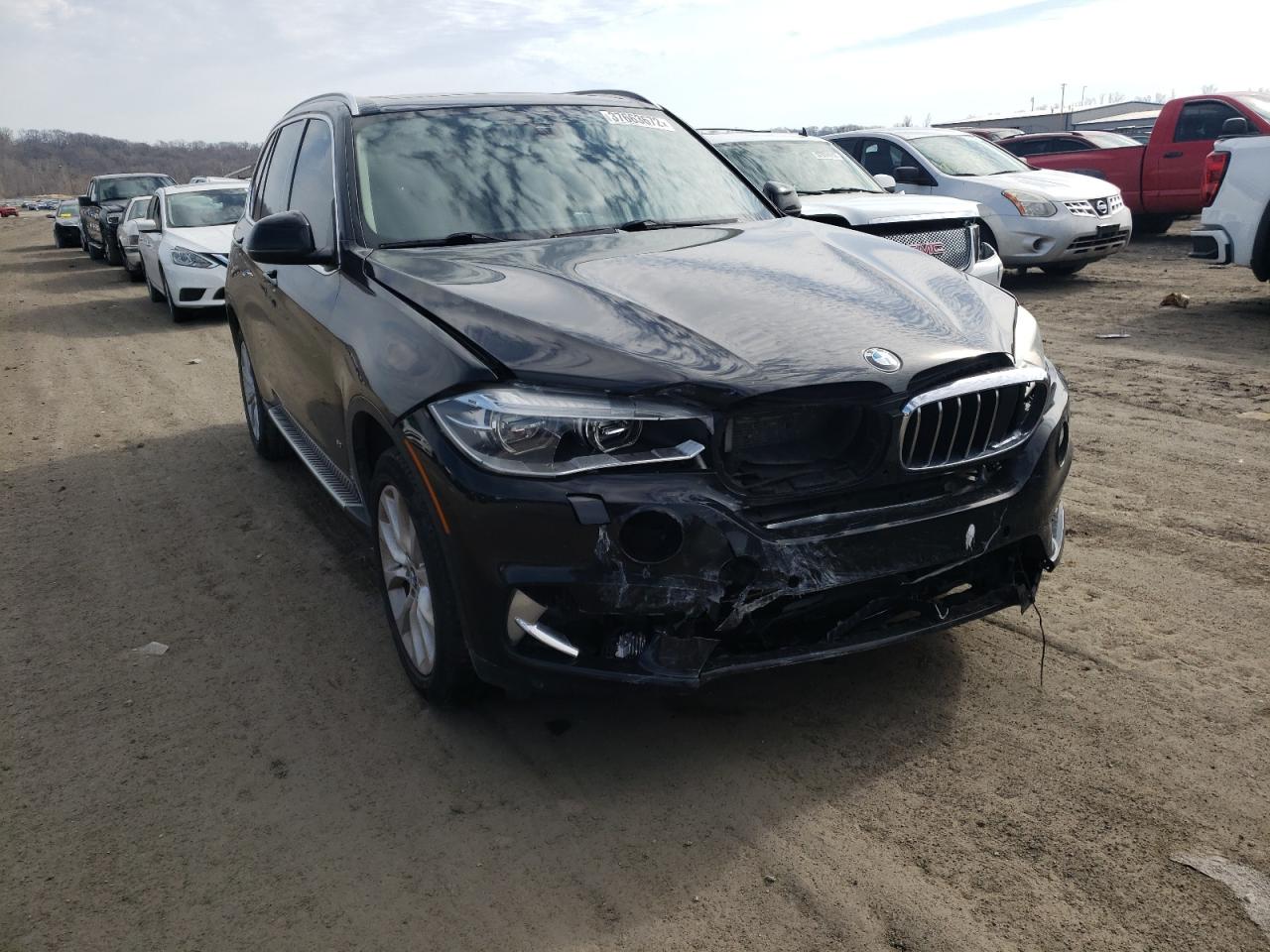 BMW X5 XDRIVE5 2014 with VIN 5UXKR6C58E0C02800 - Photo from auction