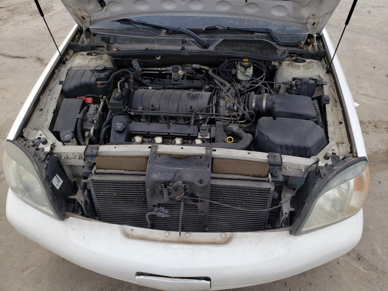 Photo 7 from auction – 2004 CADILLAC DEVILLE with VIN 1G6KD54Y14U201952