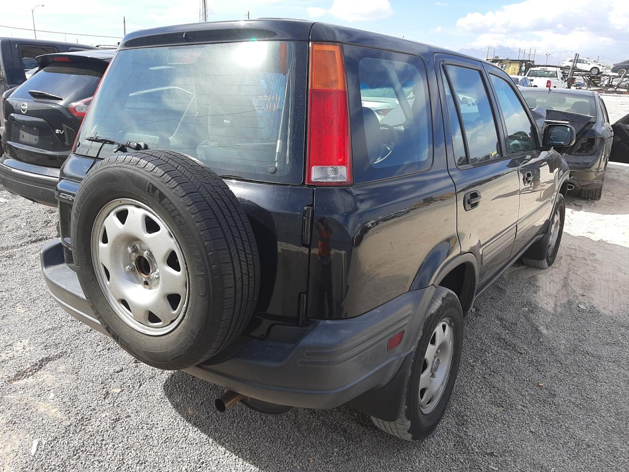 Photo 4 from auction – 2000 HONDA CR-V LX with VIN JHLRD2842YS004830
