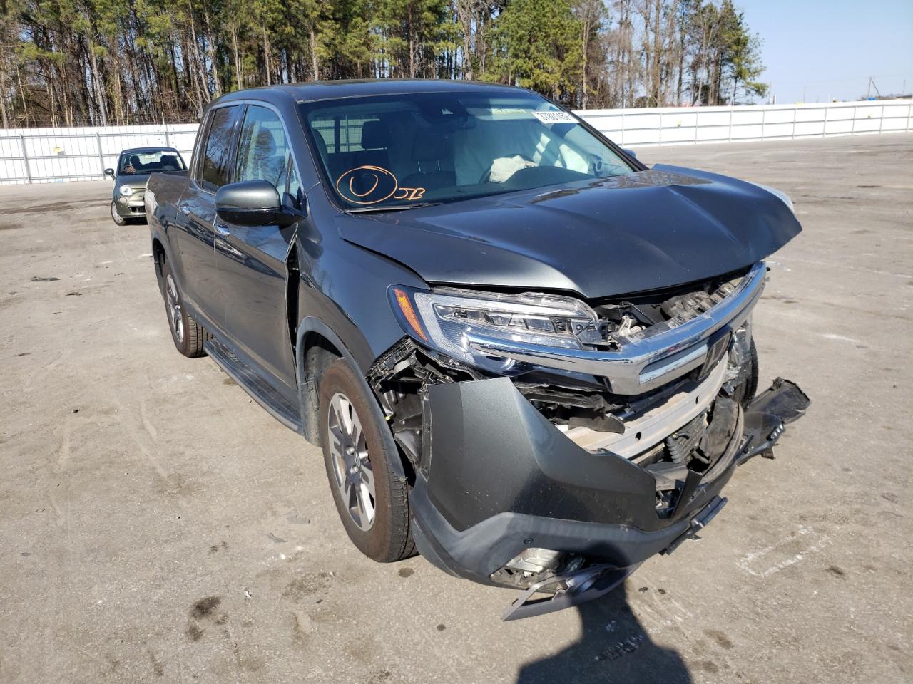 HONDA RIDGELINE 2018 with VIN 5FPYK3F70JB005020 - Photo from auction