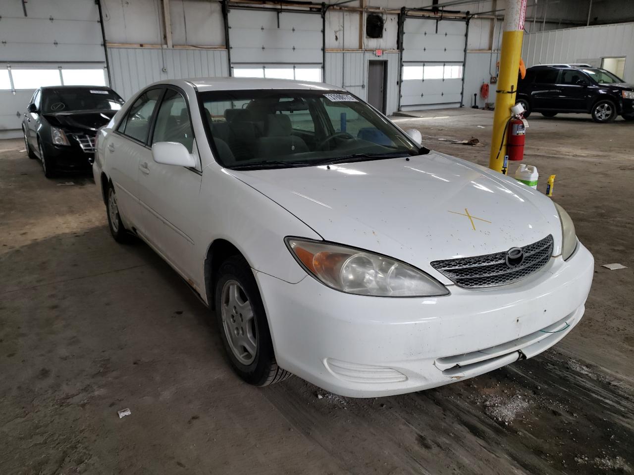 TOYOTA CAMRY LE 2002 with VIN 4T1BF32KX2U026748 - Photo from auction
