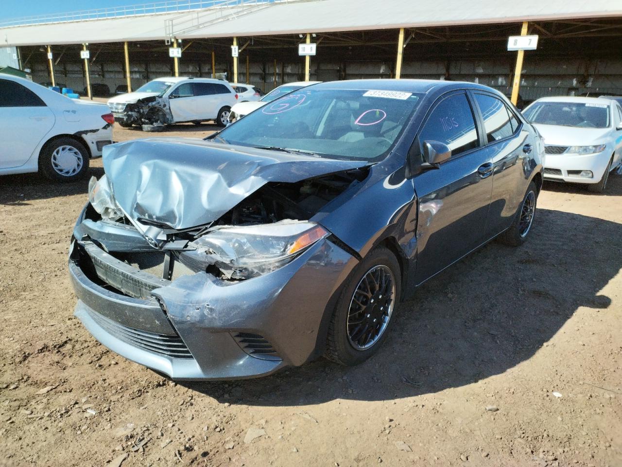 Photo 2 from auction – 2015 TOYOTA COROLLA L with VIN 5YFBURHE1FP200675