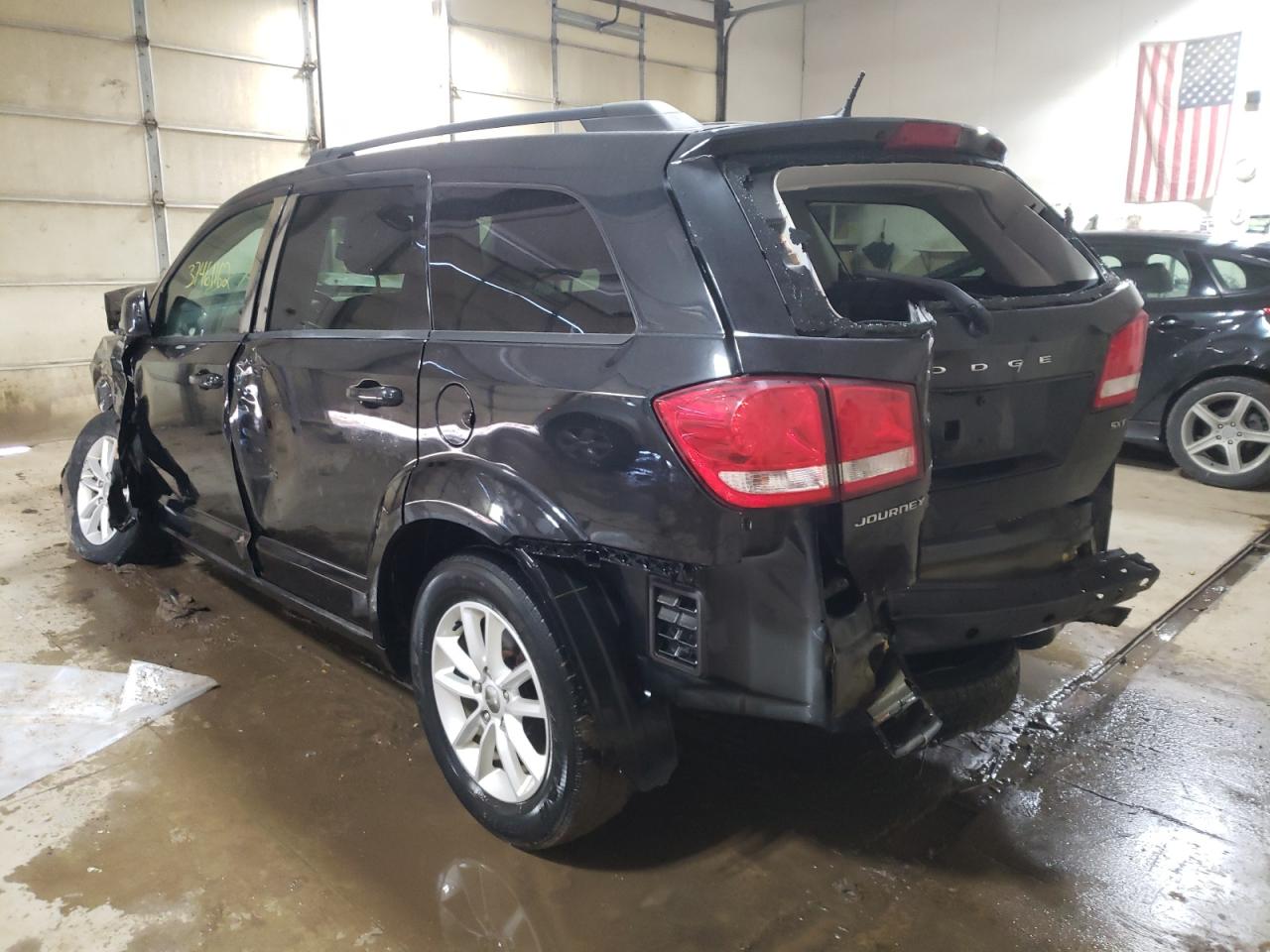 Photo 3 from auction – 2013 DODGE JOURNEY SX with VIN 3C4PDCBB1DT552635
