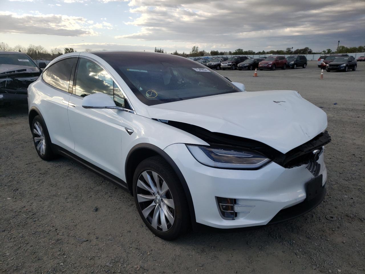 TESLA MODEL X 2019 with VIN 5YJXCAE21KF161404 - Photo from auction